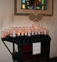 votive candles on shrine, San Agustín Cathedral