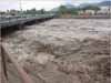 Thumbnail of Rillito River in flood, Tucson, Arizona, July 2006