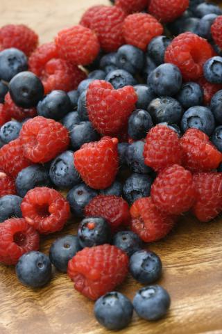 pile of mixed blueberries and raspberries (CanStockPhoto:1601963 (C) iofoto)