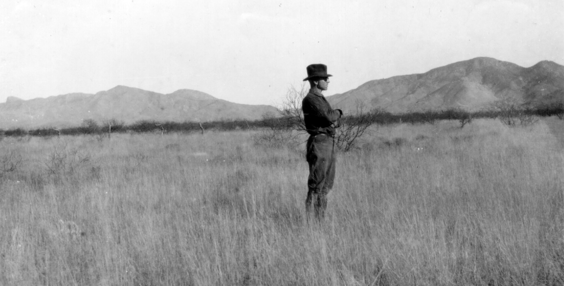 A researcher stands in the rangelands at SRER in 1922